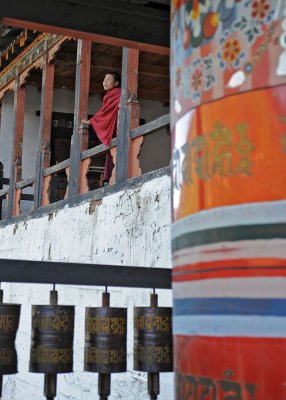 Punakha Monk With Prayer Wheels