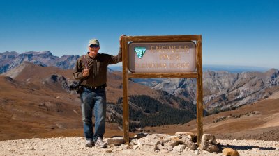 Charlie at Engineers Pass Sign Marker