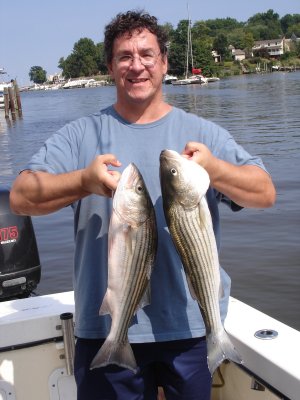 9/15/2009 Watkins Charter - Braggin' on a pair of nice Stripers caught onboard the Down Time