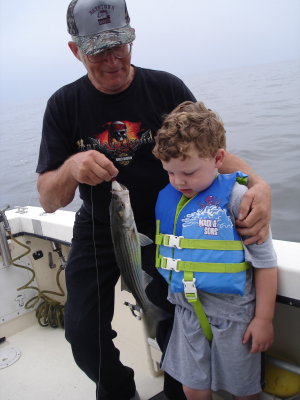 9/23/2009 Riley Family Charter - Billy with 1st Striper