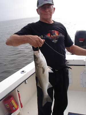 9/23/2009 Riley Family Charter - Pappy with nice Striper