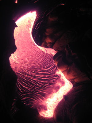 Flowing close to me, I hid frm heat behind ledge