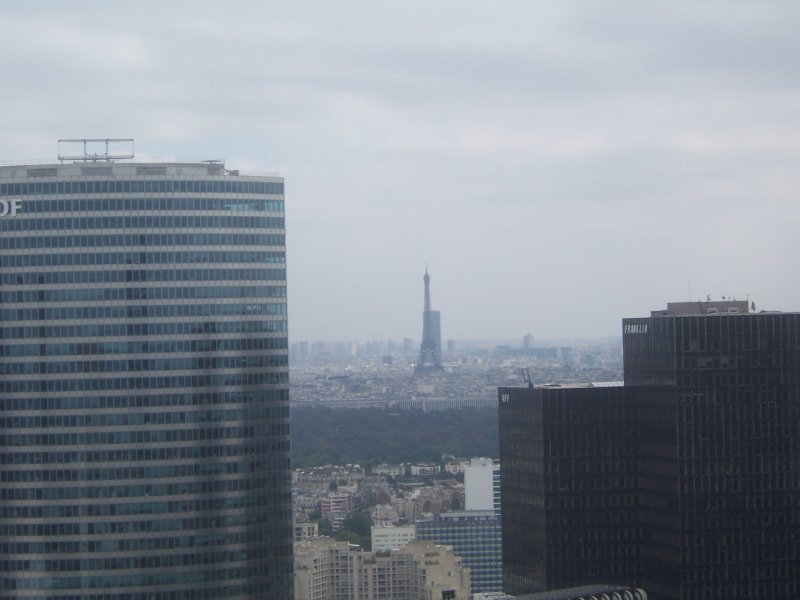 Looking from the roof of the De L Grande Arche toward the Eiffel Tower