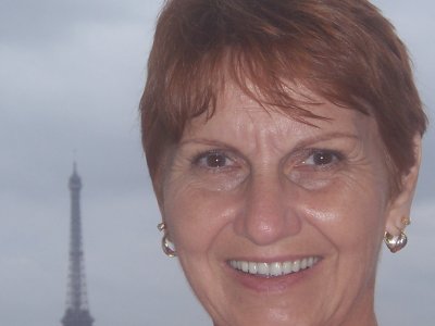 Sandy and a view of the Eiffel Tower from our room at the Cercle National Des Armees