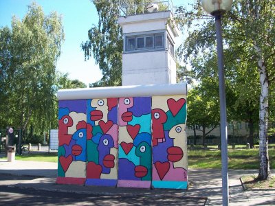 East German side of checkpoint CHARLIE and a piece of the wall turned into art