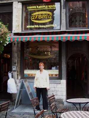 Sandy at one of her favorite waffle shops on the Grand Place Brussels BEL