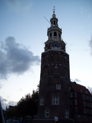 Canal Cruise, lighthouse converted into a bell tower Amsterdam NL