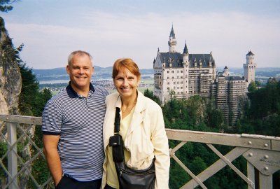 Dave and Sandy on the Marie bridge with Neuschwanstein Castle in the background AUS