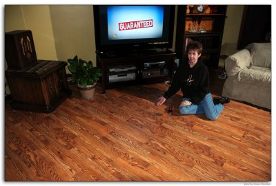 Pam showing off her new hardwood floors