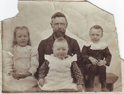 Oswald with Ella, Katie on lap, and Charles