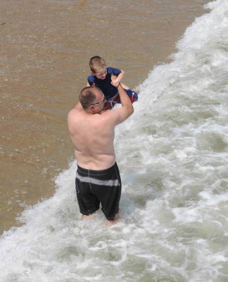 Jump the waves with daddy.jpg