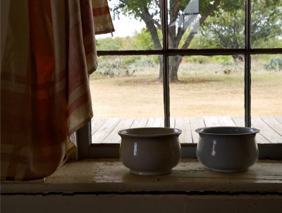 Chamber pots in window