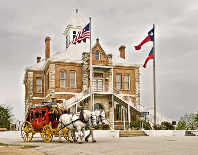 Stagecoach rounding Grimes Co. Court House