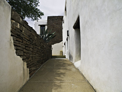 Walkway showing rock and stucco construction