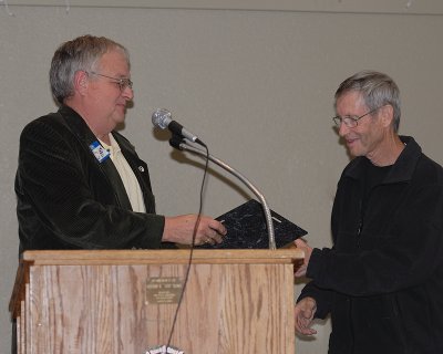 Les Boyd receiving WFA award from Larry Ray club president