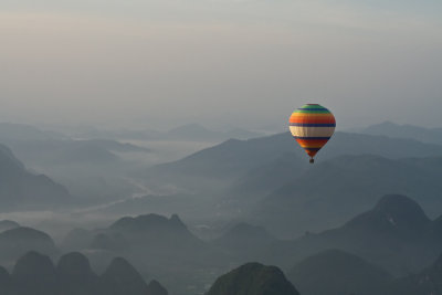 Hot air balloon above the Karst mountains