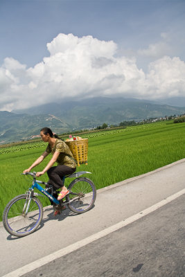 Chinese woman on bike