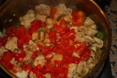 As the last ingrident add the tomatos and cook for a nother 15 to 20 min.jpg
