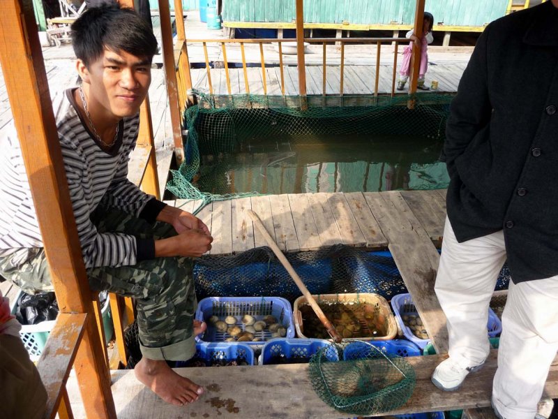 This young Vietnamese fisherman was hoping to make a sale.