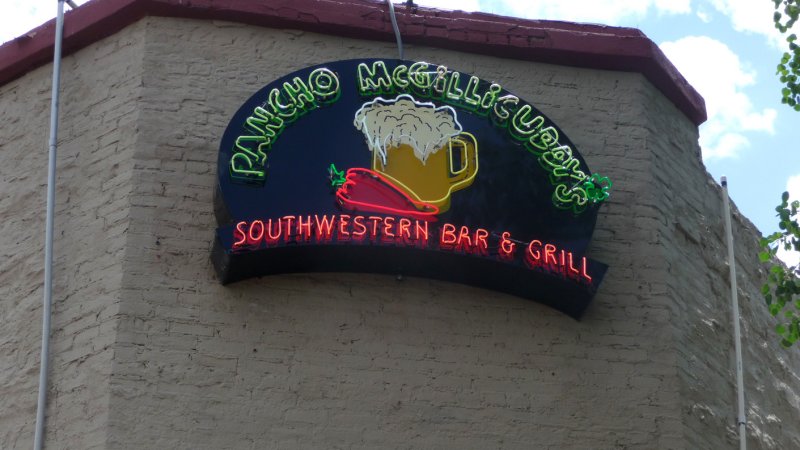 Neon sign for Pancho McGillicuddys Southwestern Bar & Grill, which is next door to the Red Garter Inn.