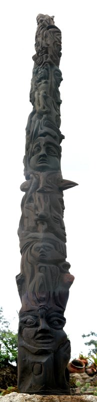 Totem pole where the eagles beak points to the Cayambe Volcano located in the Ecuadorian Andes.