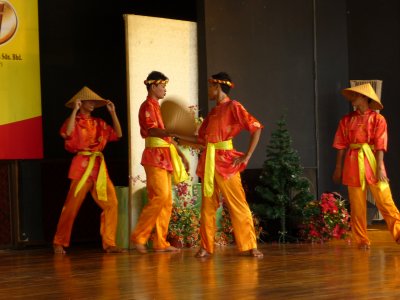 Some of the male dancers wore rice-paddy hats.