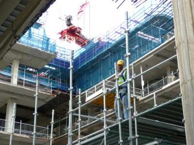 A friendly construction worker that I passed by. Orchard Road was booming with new construction.
