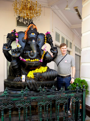 Me posing in front of this Hindu sculpture.