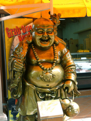 A Chinese Buddha (with a big belly) in Chinatown.