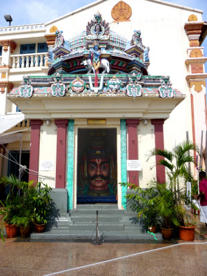Pavilion at the back of the temple with a face in the doorway.