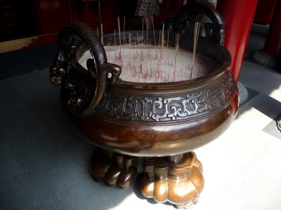 This urn for incense offerings is located at the front door of the temple.