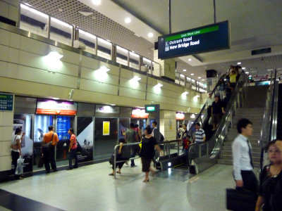 Passengers waiting for a train at the East West line.