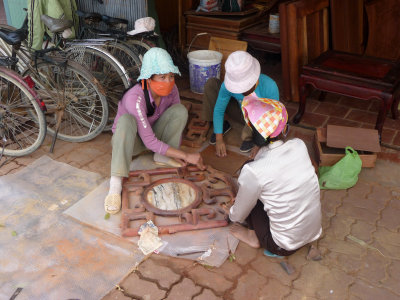 Workers making furniture in Dong Ky, a timber village about 25 km. northeast of Hanoi.