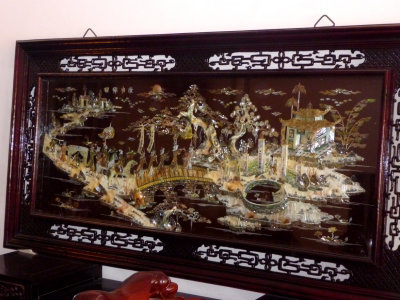 This intricate wooden piece inlaid with a mother-of-pearl Vietnamese design is truly a masterpiece!