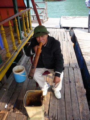 I tipped this fisherman to get this photo of him smoking his pipe.