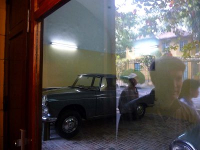 This is one of Ho Chi Minh's cars.  You can see a reflection of me in the window!