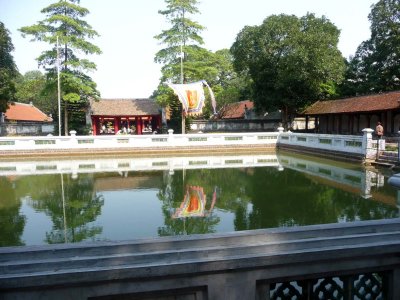 This large goldfish pond greets you as you walk into the yard.