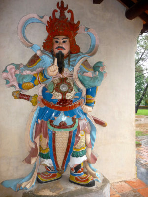 This one must be a temple guardian, too, since he is carrying a sword.