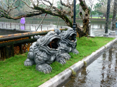 Dog-like sculptures at the Ngo Mon Gate of the Citadel (Imperial City).