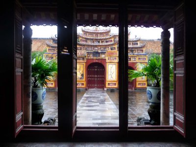 View looking from the inside of Hung Mieu of the gates across from the courtyard.