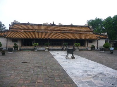 Courtyard with an incense burning urn and with Hoa Khiem Palace buildings that Tu Duc used when he was alive.