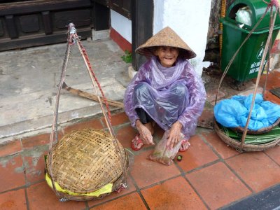 I got a photo of this toothless Vietnamese woman outside of the Phung Hung Merchant House.  I had to tip her to get the picture.