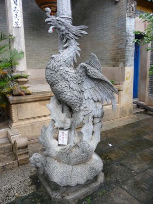 A mythical looking bird and tortoise carving at the Cantonese Assembly Hall.