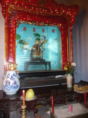 This Cantonese statue is also part of the shrine.