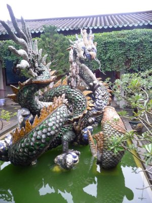 The dragon is a beautiful creation made out of pottery.