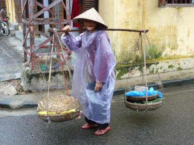 For the second time that day, I ran into the toothless woman.  She was posing again for tips.