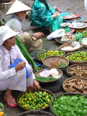 Hoi An women selling fruit and vegetables.