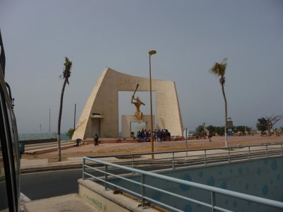 The Millenium Door sculpture was constructed in 2000 on a corniche in Dakar. It represents an entry door to the new millenium.