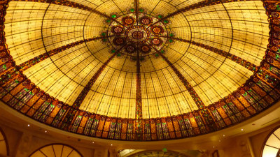 Decorative stained glass ceiling inside of the Paris Casino Resort.