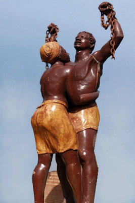 Slavery statue on Gore Island symbolizing African slaves becoming unshackled.